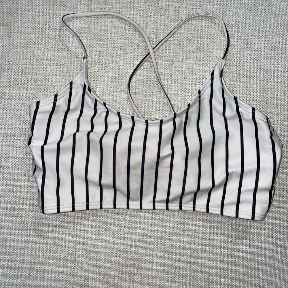 Black and white striped lace-up bikini top.